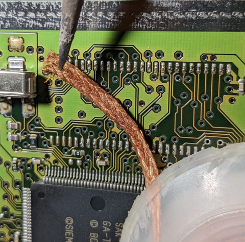 Remove old solder from the pads